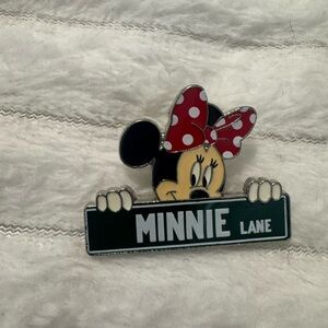 Disney Parks Authentic Minnie Lane Pin with Red Bow